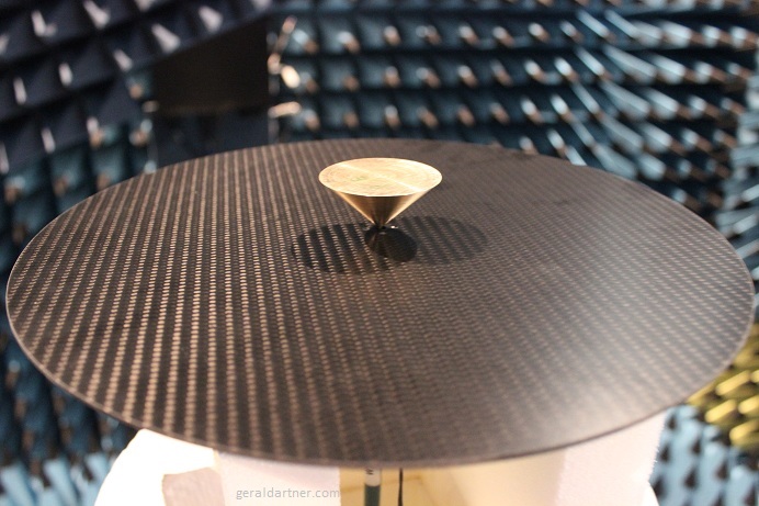 Conical Monopole Antenna on Circular CFRP Ground Plane